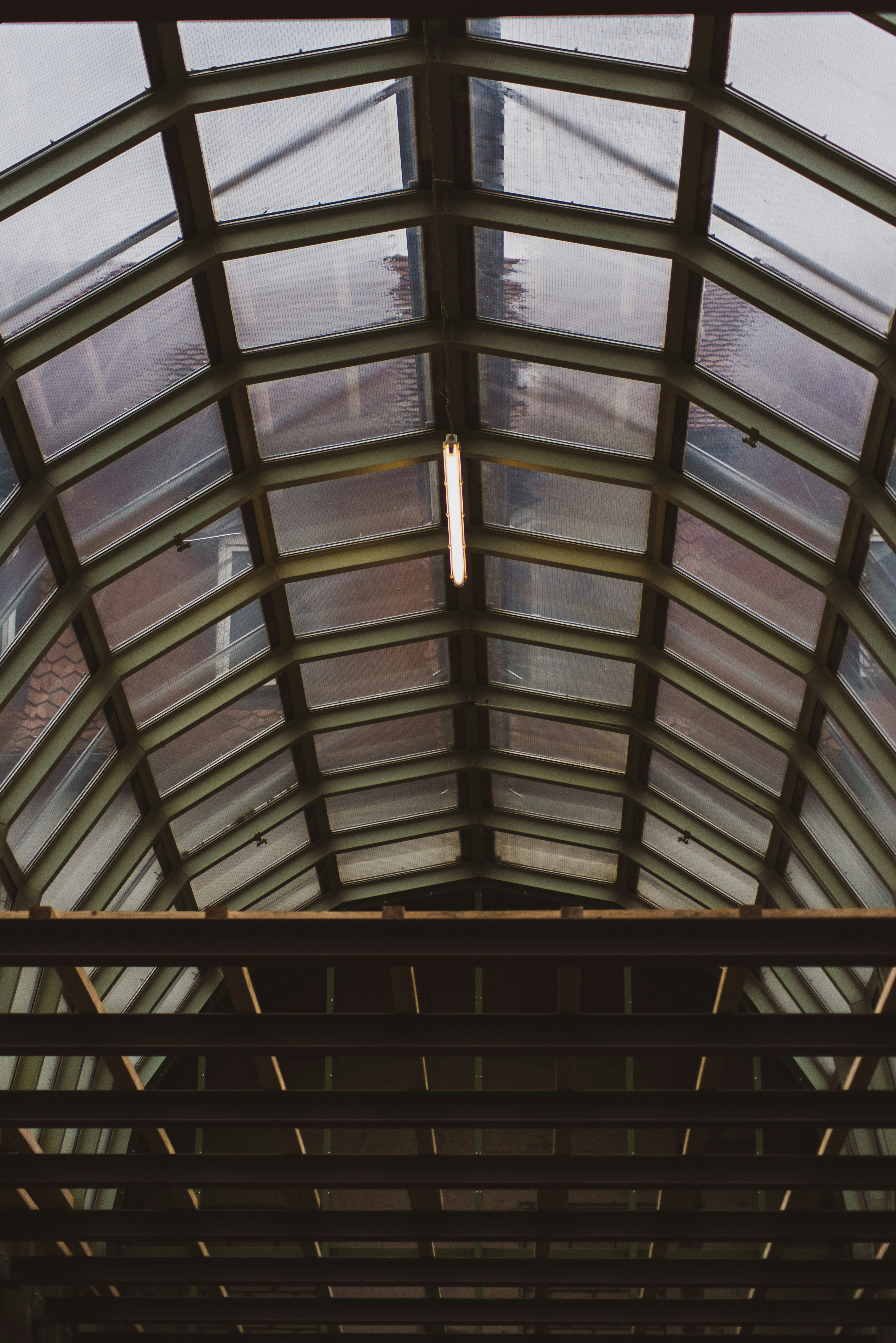 brown wooden framed glass roof
